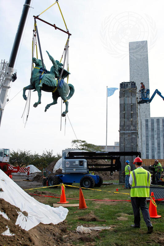 Construction Workers Hoist Peace Monument Sculpture from North Lawn