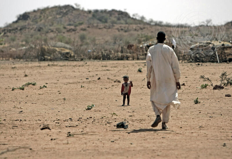 Nomad and His Son in Darfur