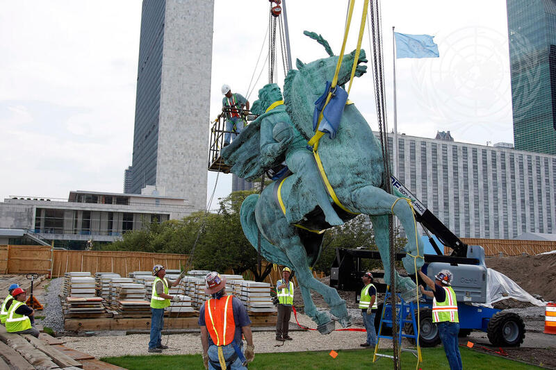 Construction Workers Hoist Peace Monument Sculpture from North Lawn