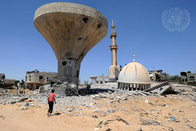 Palestinians Search through Rubble in Gaza