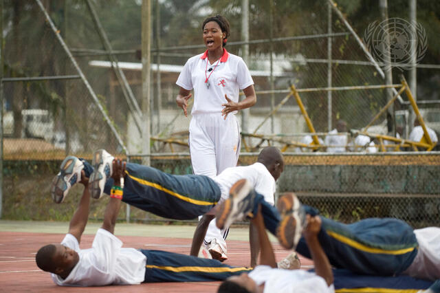 Female Peacekeeper Leads Morning Exercises at UNMIL Base
